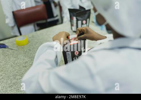 Addis Ababa, Ethiopia. 13th Jan, 2023. Workers at the Solino/Tarara coffee roastery pack coffee in Addis Ababa, Jan. Credit: dpa picture alliance/Alamy Live News Stock Photo