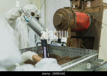 Addis Ababa, Ethiopia. 13th Jan, 2023. Workers at the Solino/Tarara coffee roastery pack coffee in Addis Ababa, Jan. Credit: dpa picture alliance/Alamy Live News Stock Photo