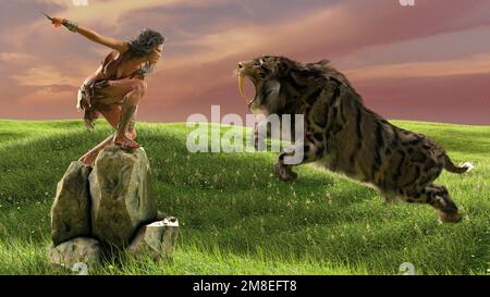 of a girl fighting with a sabre-toothed tiger Stock Photo