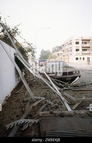 Debris litters a street after an Iraqi Scud missile was intercepted by a Patriot missile during Operation Desert Storm. Subject Operation/Series: DESERT STORM Country: Saudi Arabia (SAU) Stock Photo