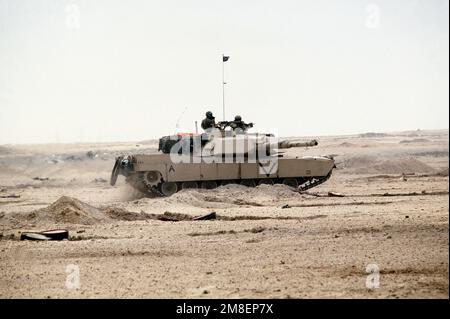 A Marine Corps M-1A1 Abrams main battle tank equipped with a mine ...