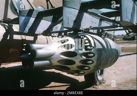 A view of an S-5 rocket pod armed with 57mm unguided aircraft rockets on the pylon of an Iraqi Mi-8 helicopter at an air field attacked by Coalition aircraft during Operation Desert Storm.. Subject Operation/Series: DESERT STORM Base: Tallil Air Base State: Dhi Qar Country: Iraq(IRQ) Stock Photo