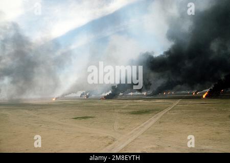 Oil well fires rage outside Kuwait City in the aftermath of the First ...