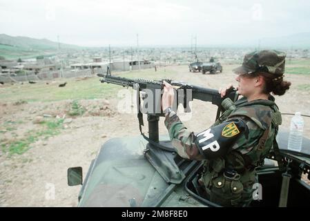 Military Police in M998 High Mobility Multi-purpose Wheeled Vehicle ...