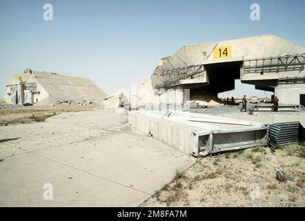 A hardened aircraft shelter at Ali Al Salem Air Base, damaged during Operation Desert Storm bombing attacks.. Base: Ali Al Salem Air Base Country: Kuwait(KWT) Stock Photo