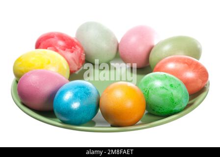 Easter eggs on plate isolated on white Stock Photo