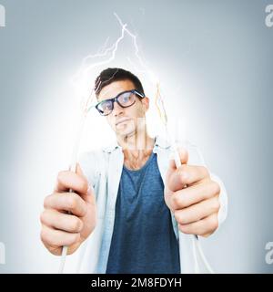 I have a wired connection. A technician holding up some frayed wires. Stock Photo