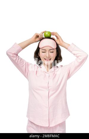 The young woman in his pyjamas Stock Photo