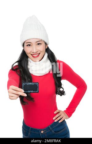 The young woman holding a card Stock Photo