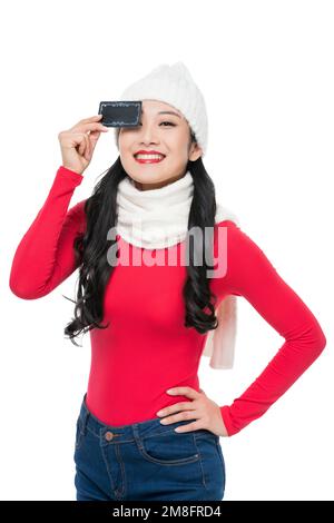 The young woman holding a card Stock Photo