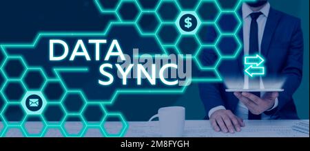 Writing displaying text Data Sync. Internet Concept data that is continuously generated by different sources Stock Photo