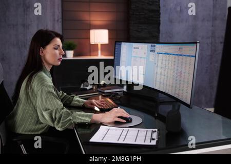 Account Manager In Office Coding Medical Bill Stock Photo