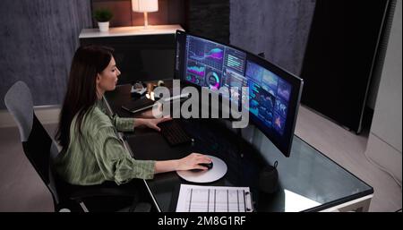 Business Woman Analyst Using KPI Data On Computer Stock Photo