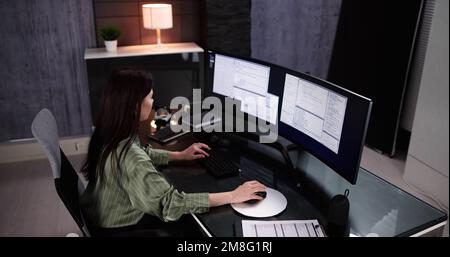 Programmer Woman Coding On Computer. Coder Girl Stock Photo