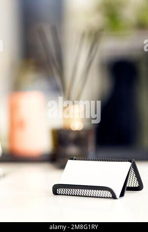 Business card holder with empty business card Stock Photo