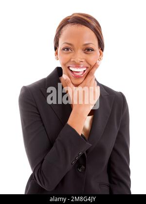 Thinking of the best business ideas. Portrait of an ethnic corporate woman smiling and touching her chin. Stock Photo