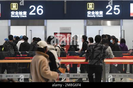 Beijing, China's Hainan Province. 7th Jan, 2023. Passengers queue for security check at Haikou Meilan International Airport in Haikou, south China's Hainan Province, Jan. 7, 2023. Credit: Yang Guanyu/Xinhua/Alamy Live News Stock Photo