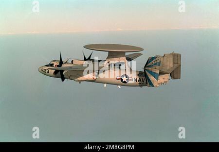 An air-to-air left side view of an Airborne Early Warning Squadron 121 (VAW-121) E-2C Hawkeye aircraft over the Persian Gulf. Country: Unknown Stock Photo