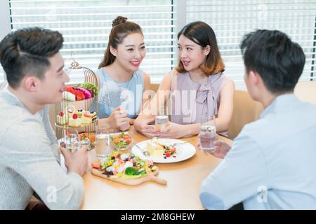 The afternoon tea time of young people Stock Photo