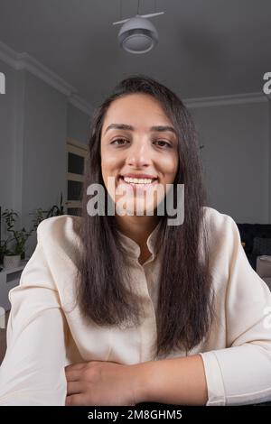 Happy business woman talking video conference call on phone. Freelance distant client conversation.  Smartphone camera, webcam online job. Stock Photo