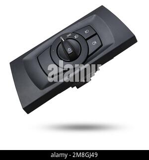 Close-up on the headlight switch control buttons and automatic adjust level dashboard of car in the vehicle repair workshop on white isolated backgrou Stock Photo