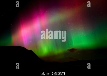 Aurora borealis over Loch Brora, Sutherland Stock Photo