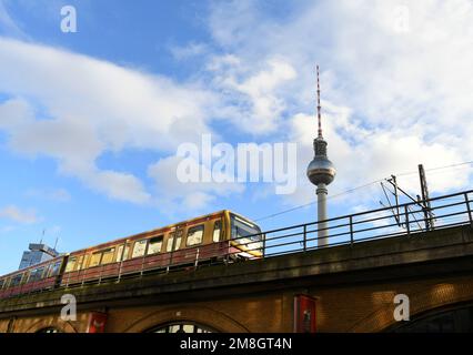 Berlin, Germany. 13th Jan, 2023. A train runs past the TV Tower in Berlin, Germany, Jan. 13, 2023. Germany's price-adjusted gross domestic product (GDP) in 2022 was 1.9 percent higher than in the previous year, according to preliminary figures published by the Federal Statistical Office (Destatis) on Friday. Credit: Ren Pengfei/Xinhua/Alamy Live News Stock Photo