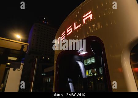 October 20, 2022 Astana, Kazakhstan: Charging station supercharger for Tesla electric vehicles close-up at night Stock Photo