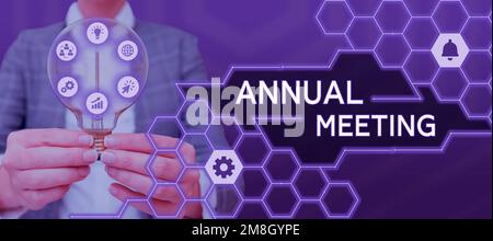 Writing displaying text Annual Meeting. Word for Yearly gathering of an organization interested shareholders Stock Photo
