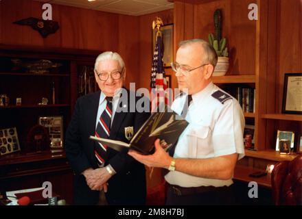 COL. James Moen, the last wing commander of the 354th Fighter Wing, reads excerpts from the 354th's first yearbook as retired COL. Francis 'Gabby' Gabreski, the wing's first commander, looks on. The yearbook will be sent to the Air Force Museum in Dayton, Ohio. Base: Myrtle Beach State: South Carolina (SC) Country: United States Of America (USA) Stock Photo