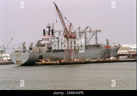 A starboard quarter view of the Military Sealift-chartered container/cargo ship CAPE NONE (T-AK-1014) undergoing routine overhaul at the Newport News Shipbuilding and Dry Dock Corporation on the James River. Base: Newport News State: Virginia (VA) Country: United States Of America (USA) Stock Photo