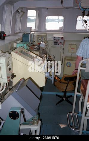 An interior view of the bridge of the USNS HIDDENSEE (185NS9201) while the ship is moored at the Naval Sea Systems Command facility at Solomons Annex. The Soviet-built Tarantul I class missile corvette was acquired from the Federal German navy in November 1991, and is currently undergoing testing and evaluation by the U.S. Navy. Named Rudolf Egelhofer in the East German navy, the ship was renamed HIDDENSEE after the reunification of Germany in 1990. Country: Solomons Stock Photo