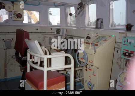 An interior view of the bridge of the USNS HIDDENSEE (185NS9201) while the ship is moored at the Naval Sea Systems Command facility at Solomons Annex. The Soviet-built Tarantul I class missile corvette was acquired from the Federal German navy in November 1991, and is currently undergoing testing and evaluation by the U.S. Navy. Named Rudolf Egelhofer in the East German navy, the ship was renamed HIDDENSEE after the reunification of Germany in 1990. Country: Solomons Stock Photo