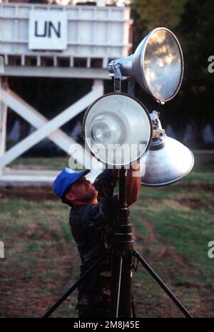 Perimeter lights being set-up at the Base Camp. Subject Operation ...