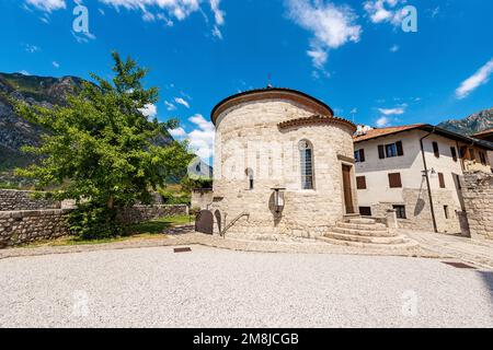 Venzone, small ancient Baptistery or Chapel of San Michele, with the crypt of the mummies, Cathedral of St. Andrew the Apostle, 1308. Friuli, Italy. Stock Photo