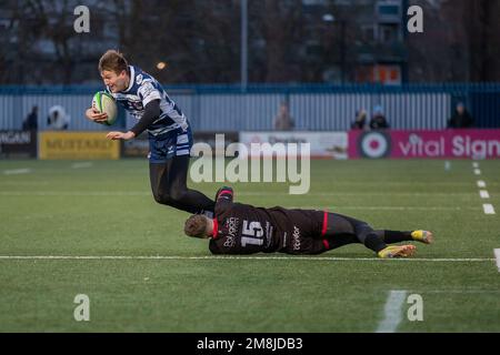 Coventry, UK. 14th Jan, 2023. *** James Martin of Coventry tackled during the Rugby Championship match between Coventry and Jersey Reds at Butts Park Arena, Coventry, UK on 14 January 2023. Photo by Simon Hall. Editorial use only, license required for commercial use. No use in betting, games or a single club/league/player publications. Credit: UK Sports Pics Ltd/Alamy Live News Stock Photo