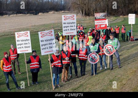 Rosenheim, Germany. 14th Jan, 2023. Boards of citizens' initiatives in the Rosenheim district stand together at an information meeting against the controversial new construction of the double-track rail line through the Bavarian Inn Valley. The new line is to be a feeder to the Brenner Base Tunnel, which is being built in Austria and Italy and is scheduled for completion in ten years. The German line is not scheduled to go into operation until around 2040. Credit: Uwe Lein/dpa/Alamy Live News Stock Photo