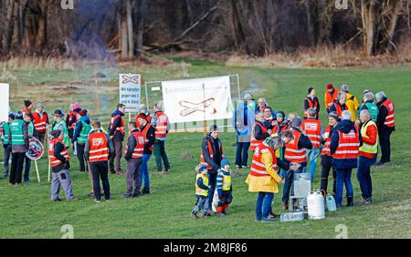 Rosenheim, Germany. 14th Jan, 2023. Boards of citizens' initiatives in the Rosenheim district stand together at an information meeting against the controversial new construction of the double-track rail line through the Bavarian Inn Valley. The new line is to be a feeder to the Brenner Base Tunnel, which is being built in Austria and Italy and is scheduled for completion in ten years. The German line is not scheduled to go into operation until around 2040. Credit: Uwe Lein/dpa/Alamy Live News Stock Photo