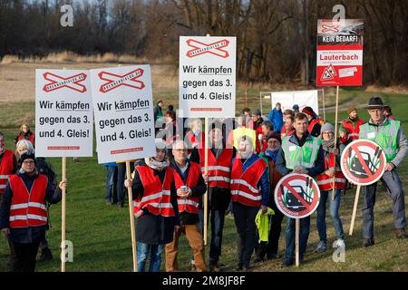 Rosenheim, Germany. 14th Jan, 2023. Boards of citizens' initiatives in the Rosenheim district stand together at an information meeting against the controversial new construction of the double-track rail line through the Bavarian Inn Valley. The new line is to be a feeder to the Brenner Base Tunnel, which is being built in Austria and Italy and is scheduled for completion in ten years. The German line is not scheduled to go into operation until around 2040. Credit: Uwe Lein/dpa/Alamy Live News Stock Photo