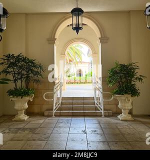 Jupiter, FL USA - May 31, 2022:  The entrance to the courtyard at the Trump National Golf Course Club House in Jupiter, Florida. Stock Photo