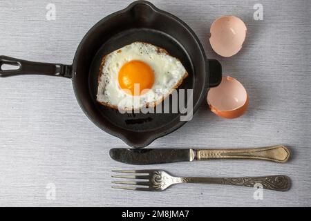 fried egg in a frying pan Stock Photo