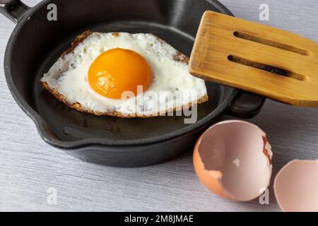 fried egg in a frying pan Stock Photo