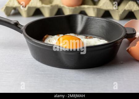 fried egg in a frying pan Stock Photo