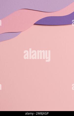 Abstract colored paper texture background. Minimal paper cut composition with layers of geometric shapes and lines in pastel pink and violet purple Stock Photo