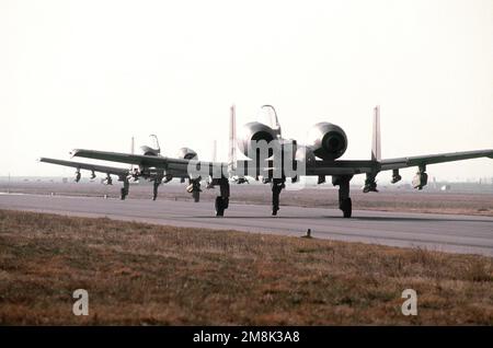 Two A-10 Thunderbolts from the 110th Air National Guard, Battle Creek, Michigan, taxi out onto the runway for a mission. Subject Operation/Series: DENY FLIGHT Base: Aviano Air Base State: Pordenone Country: Italy (ITA) Stock Photo