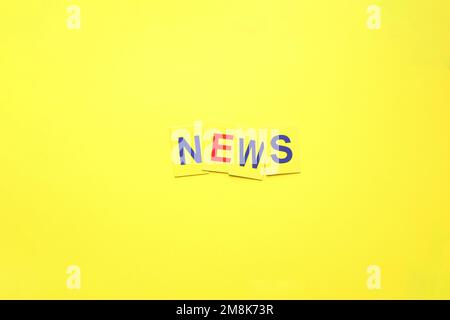News concept. Inscription in yellow letters. Stock Photo
