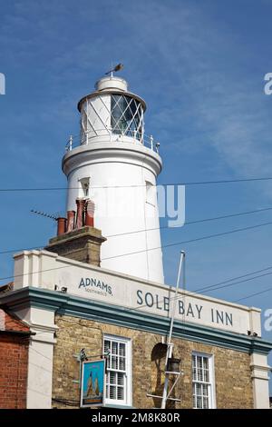 Sole bay inn pub and lighthouse in the town of Southwold, Suffolk, England. Stock Photo