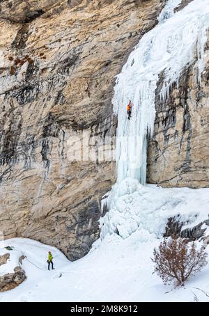 Greg Moore climbs the Boy Scout ice climb rated WI 4-5 in The Ruby Mountains Stock Photo