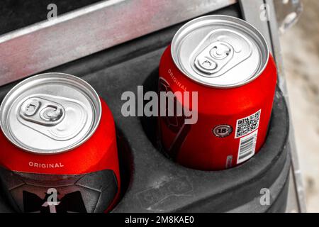 Tecate red beer while driving golf cart on Isla Holbox island in Quintana Roo Mexico. Stock Photo