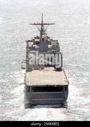 Aerial stern-on view of the dock landing ship USS HARPERS FERRY (LSD-49) underway off the coast of San Diego. Country: Pacific Ocean (POC) Stock Photo